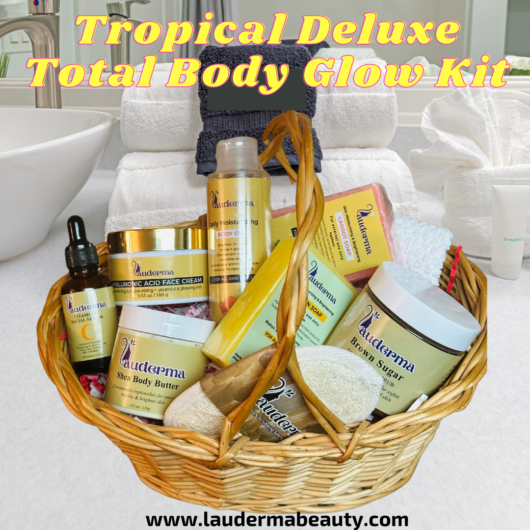 Gab the tropical deluxe total body glow kit. a collection of lauderma's products in a a basket.